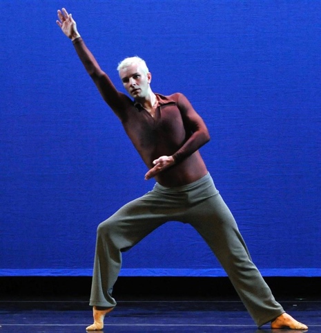 A person dancing on a stage

Description automatically generated