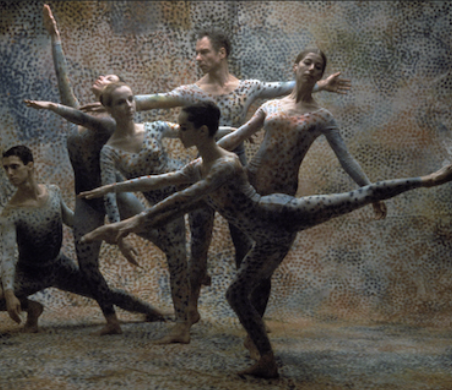 A group of people dancing

Description automatically generated