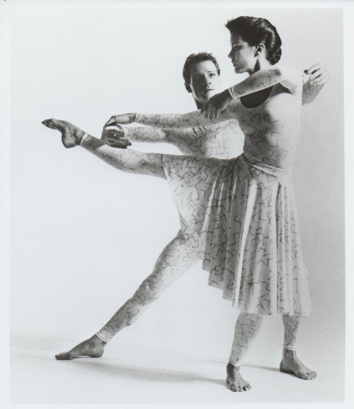 A couple of women dancing

Description automatically generated