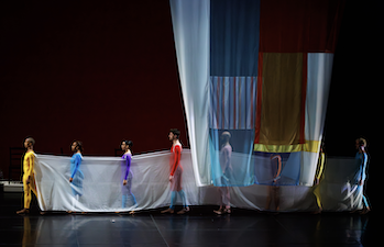 A group of people on a stage

Description automatically generated