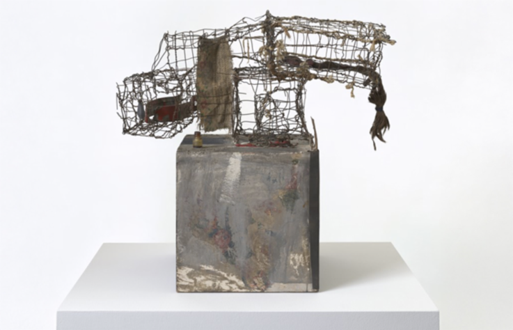 A sculpture on a white surface

Description automatically generated