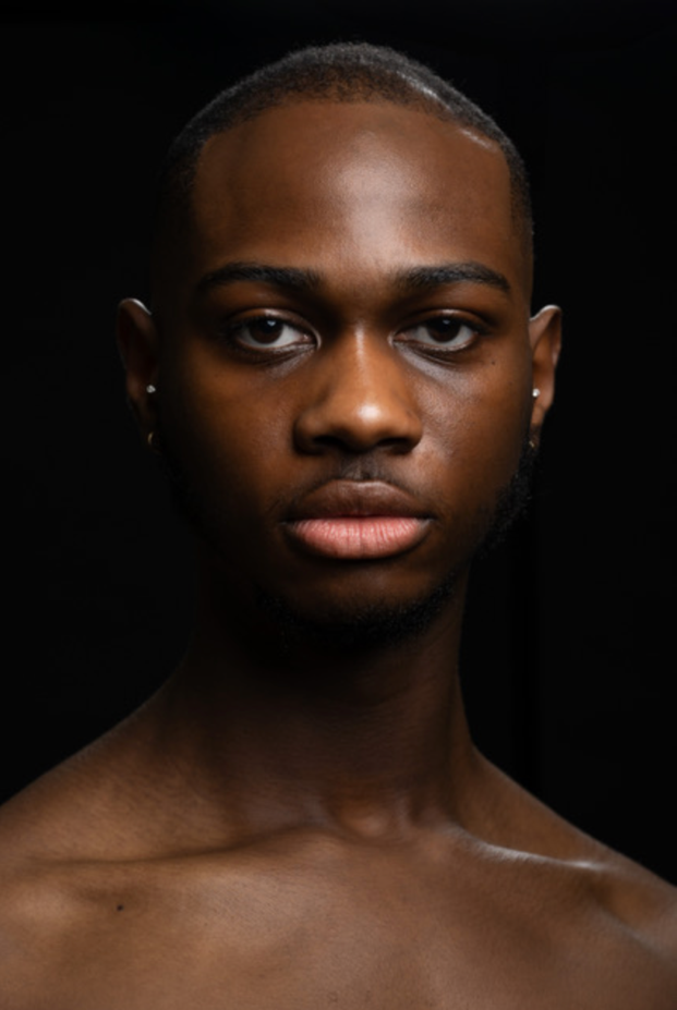 A person with no shirt

Description automatically generated