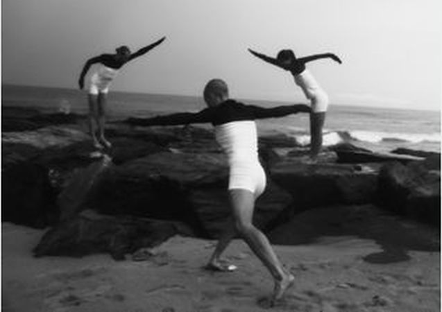 A group of people on a beach

Description automatically generated