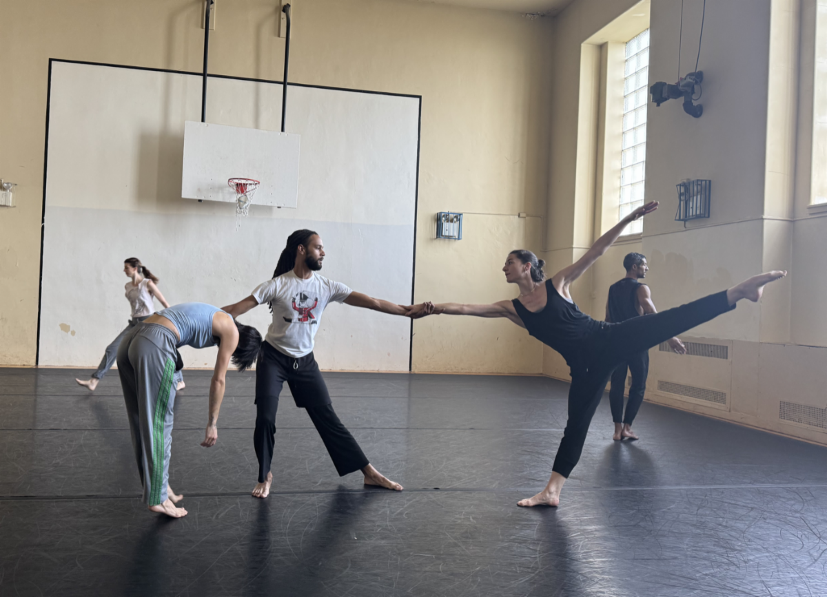 A group of people in a room

Description automatically generated